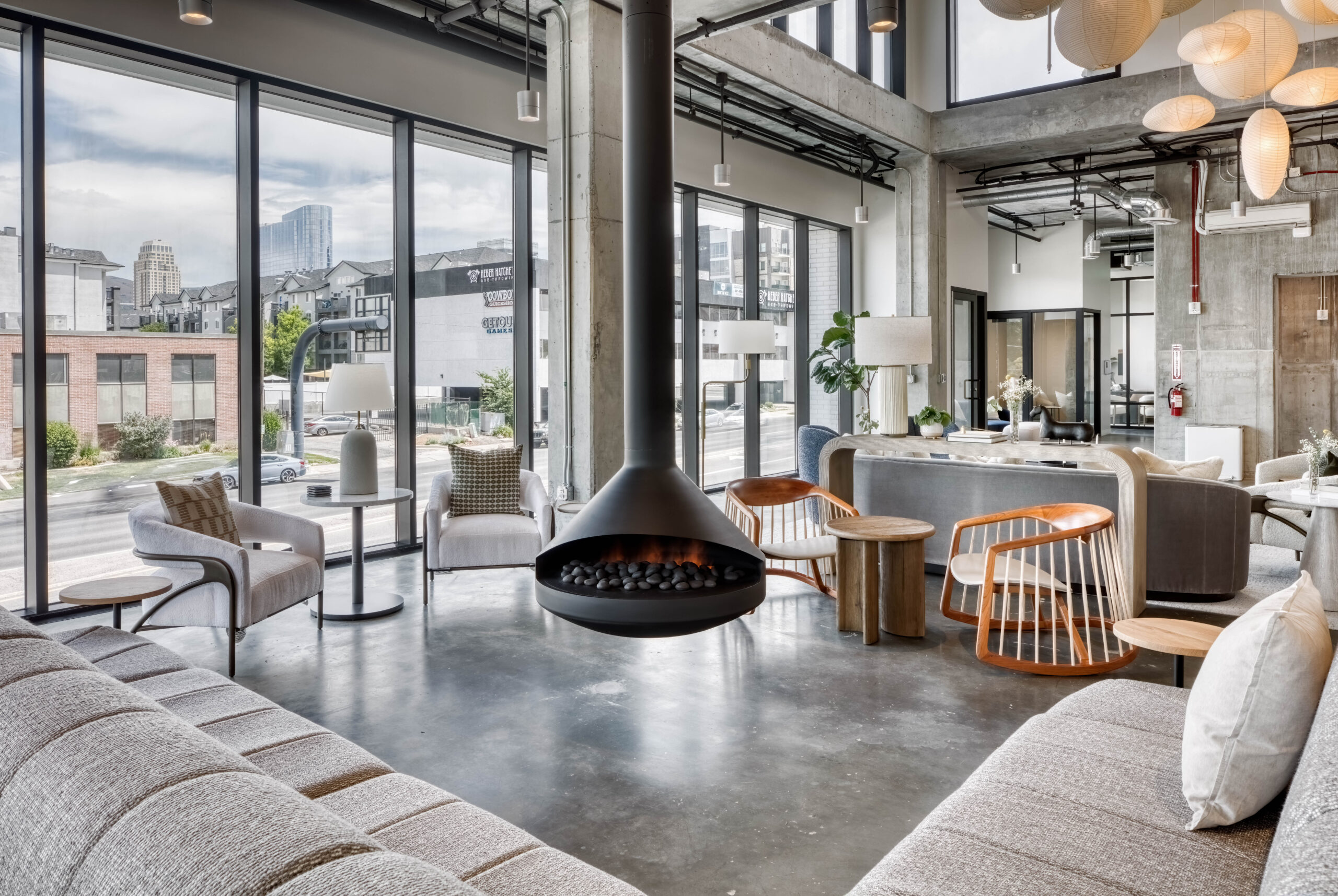 Seating area with fireplace in luxury apartment community in Salt Lake City.