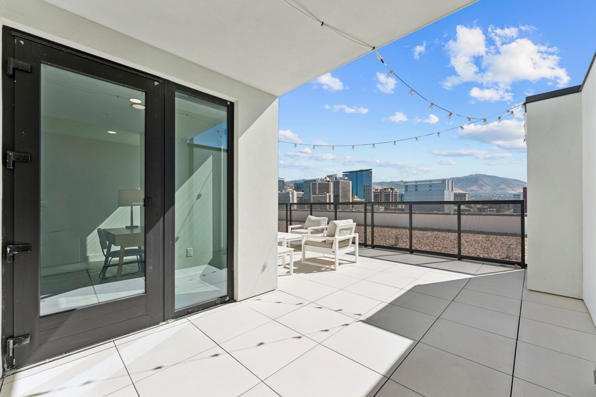Private wrap around balcony in penthouse apartment at Brix Residences.