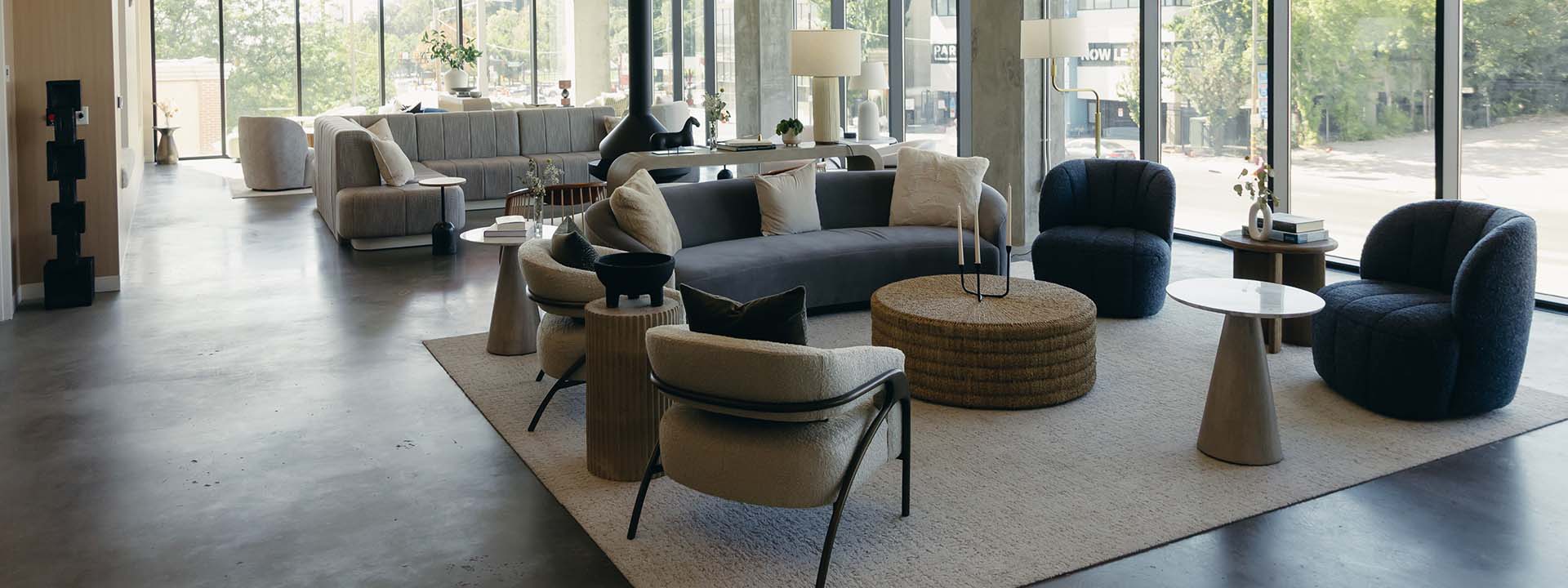 Brix apartments clubhouse with plush seating, large windows, and elegant decor.
